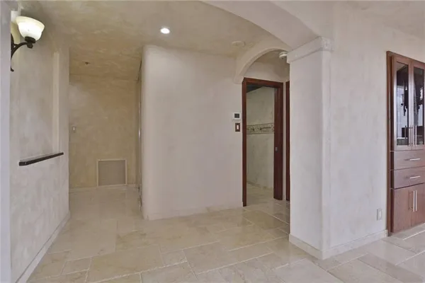 a view of an entryway with a chandelier