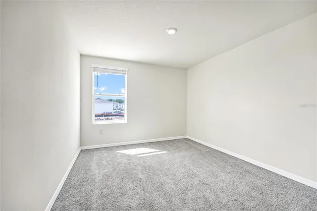 an empty room with a window