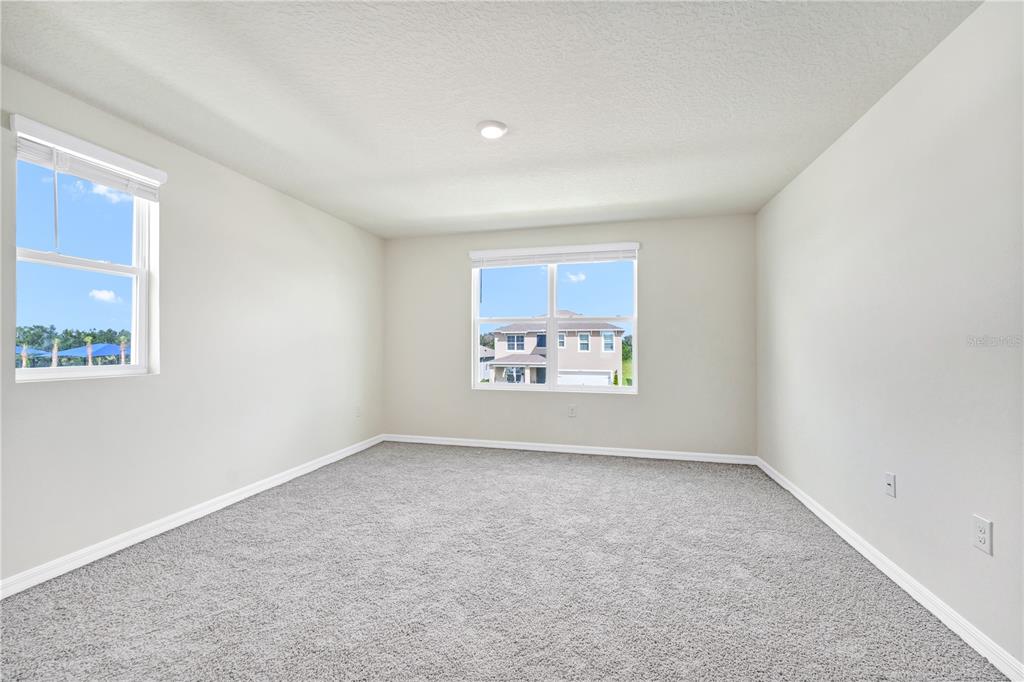 5650 Anders Way St. Cloud, FL 34771 - Photo 25 of 39 an empty room with a window