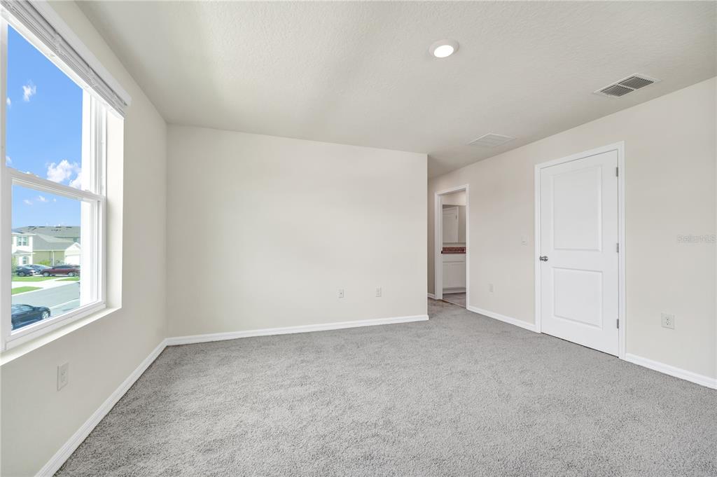 5650 Anders Way St. Cloud, FL 34771 - Photo 28 of 39 a view of an empty room with a window