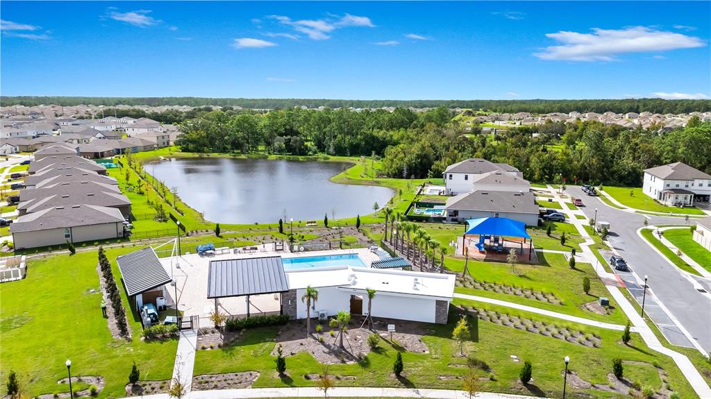 5650 Anders Way St. Cloud, FL 34771 - Photo 32 of 39 a view of a chairs and table in a patio