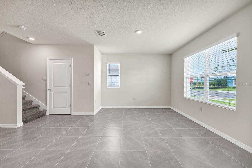 5650 Anders Way St. Cloud, FL 34771 - Photo 10 of 39 a view of an empty room with a window