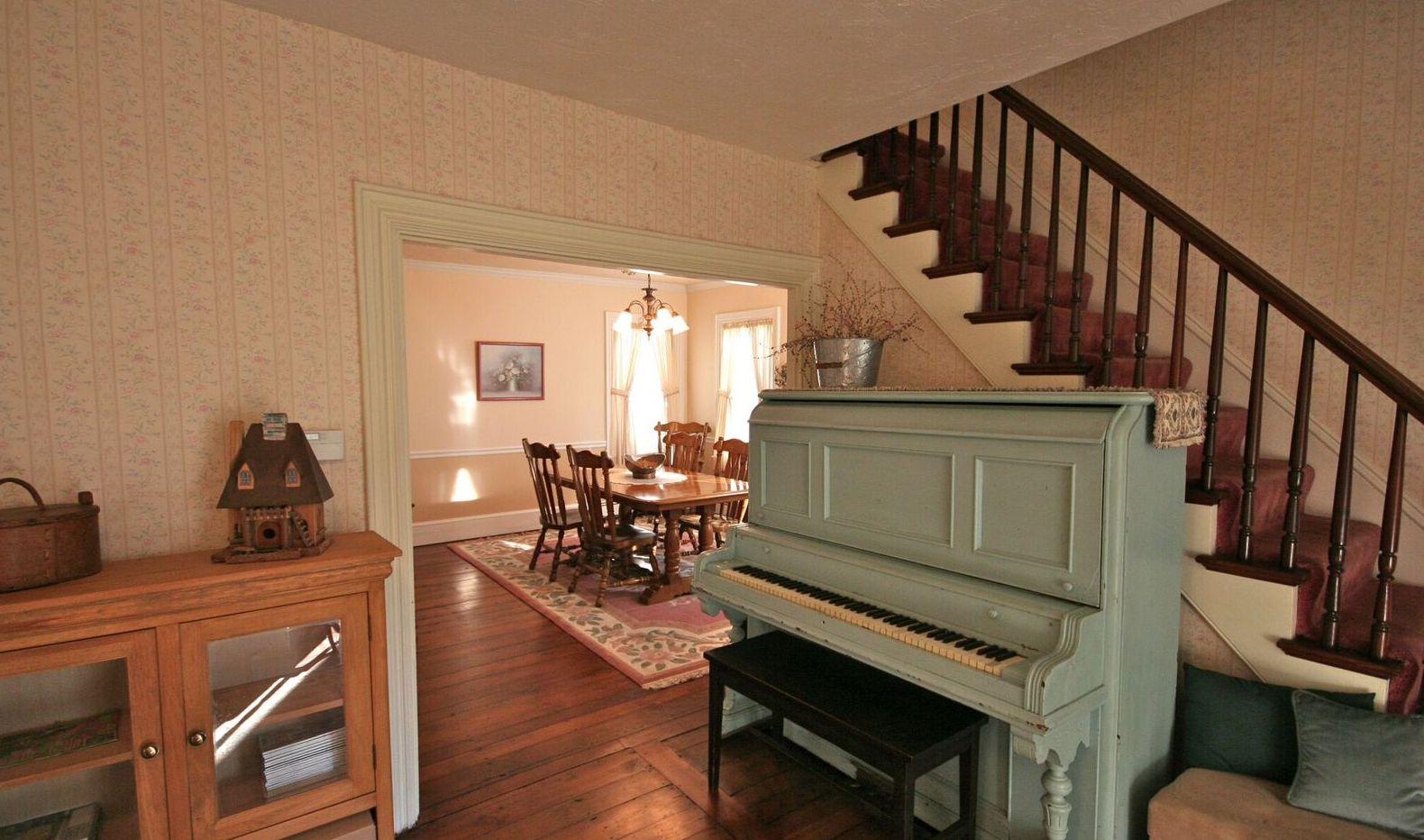 877 Shore Road Pocasset, MA 02559 - Photo 13 of 24 Front stairs with piano