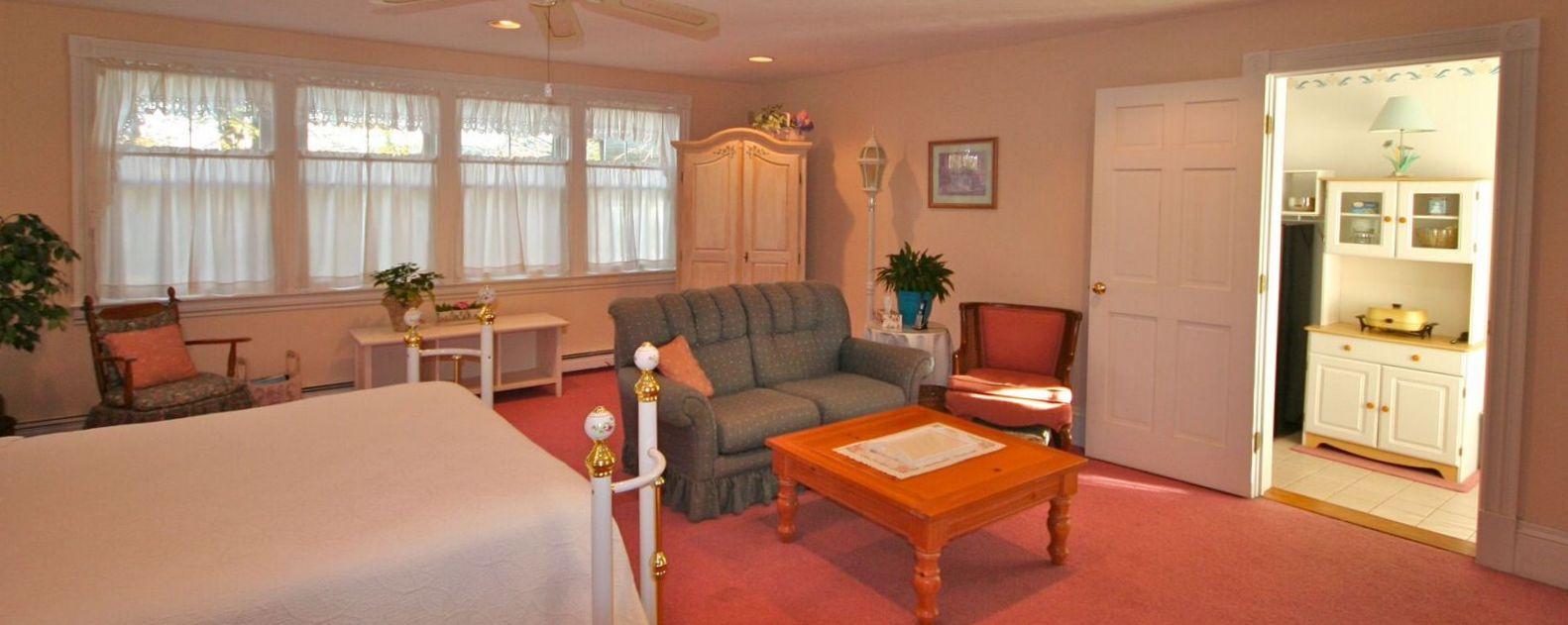 877 Shore Road Pocasset, MA 02559 - Photo 18 of 24 First Floor Master looking into Kitchene