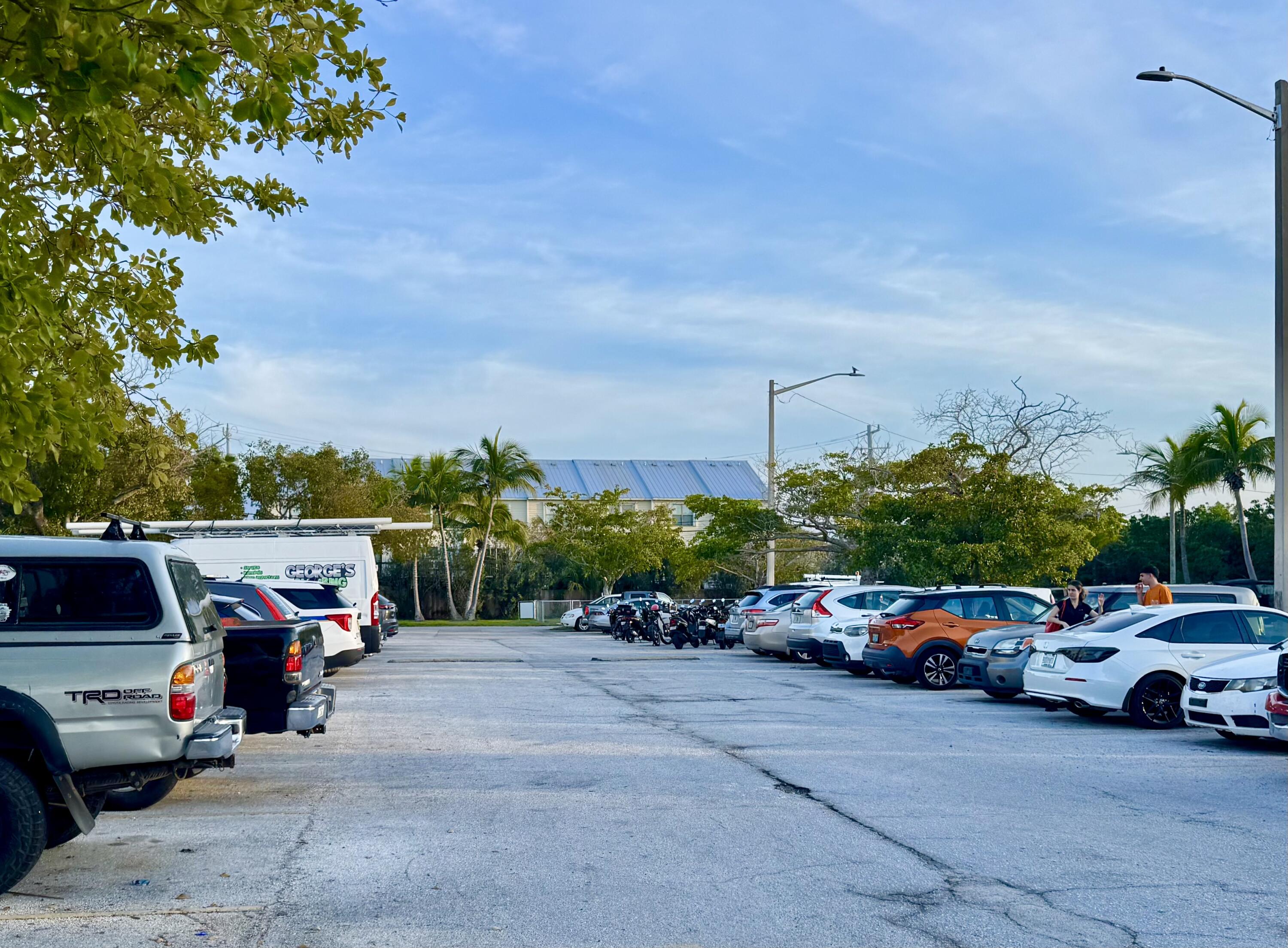 3312 Northside Drive, Unit 405 Key West, FL 33040 - Photo 24 of 25 a cars parked in front of a building