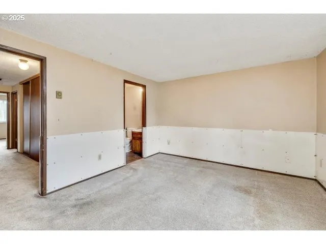 an empty room with closet