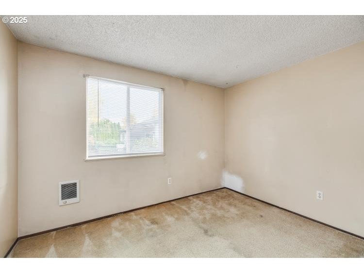 159 Southwest Florence Avenue Gresham, OR 97080 - Photo 15 of 24 a view of an empty room with a window