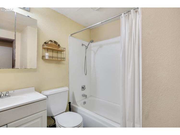 159 Southwest Florence Avenue Gresham, OR 97080 - Photo 17 of 24 a bathroom with a sink a toilet and shower