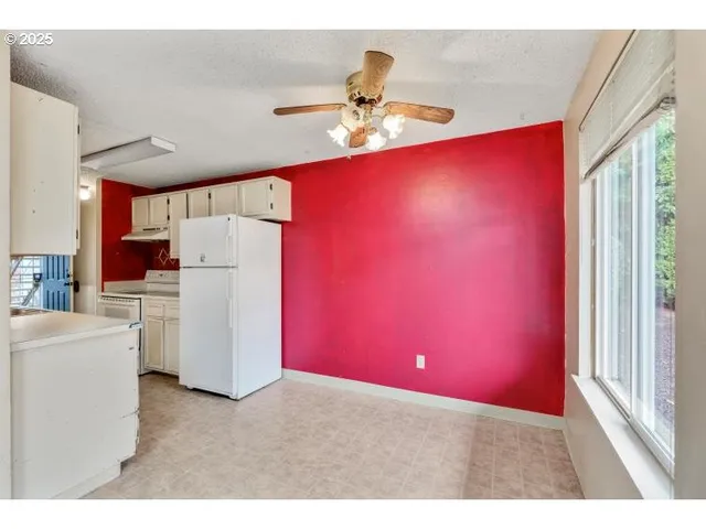 a very nice looking room with a kitchen