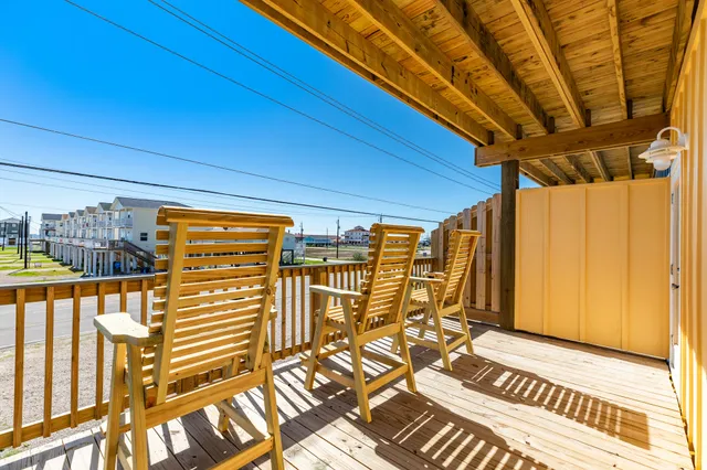 a view of balcony with wooden floor and outdoor space