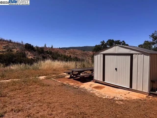 a view of a house with a lake view