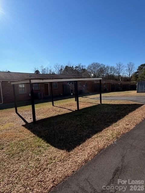 1015 20th Street Northeast Hickory, NC 28601 - Photo 11 of 13 a view of a street with a yard