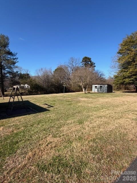 1015 20th Street Northeast Hickory, NC 28601 - Photo 12 of 13 a view of swimming pool with a yard