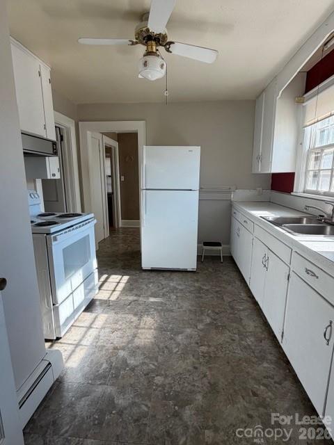1015 20th Street Northeast Hickory, NC 28601 - Photo 8 of 13 a kitchen with cabinets and wooden floor