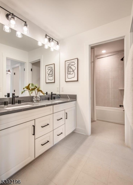 20 Whitaker Lane Far Hills, NJ 07931 - Photo 13 of 18 a spacious bathroom with a granite countertop sink mirror and shower