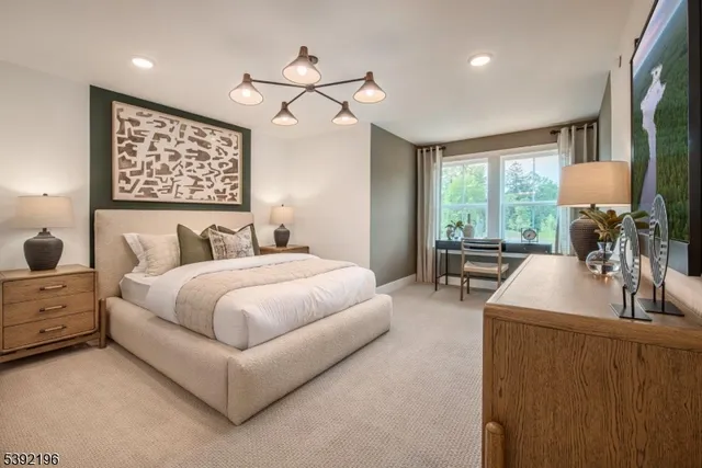 a bedroom with bed and window