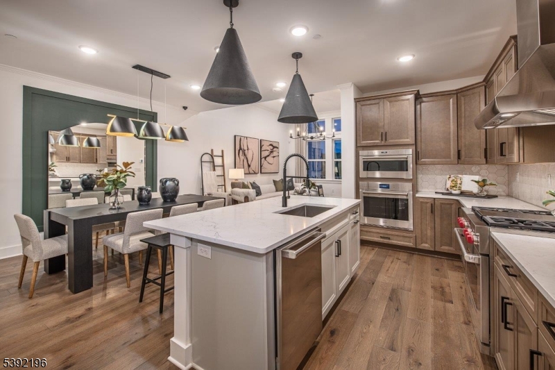 20 Whitaker Lane Far Hills, NJ 07931 - Photo 2 of 18 a kitchen with stainless steel appliances a sink a stove and a refrigerator