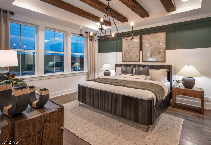 20 Whitaker Lane Far Hills, NJ 07931 - Photo 9 of 18 a bedroom with a bed and wooden floor