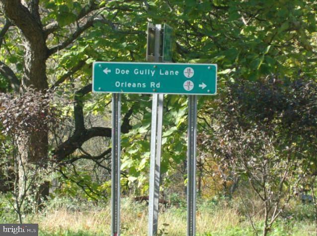 Low Line Road Great Cacapon, WV 25422 - Photo 9 of 21 County Road sign on way to Property