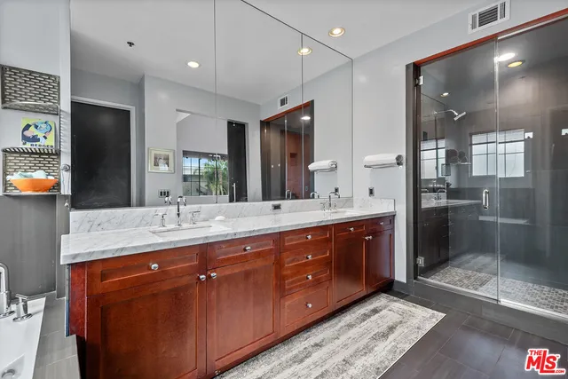 a balcony with a table and chairs