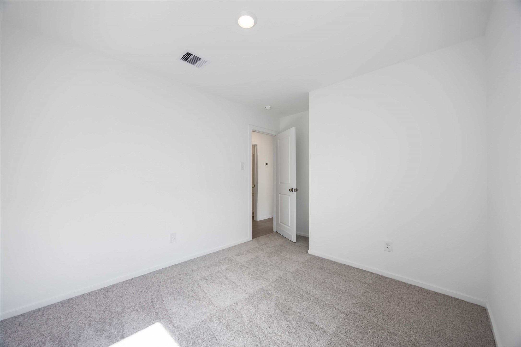 385 Lucia Way Cleveland, TX 77327 - Photo 21 of 30 a view of an empty room