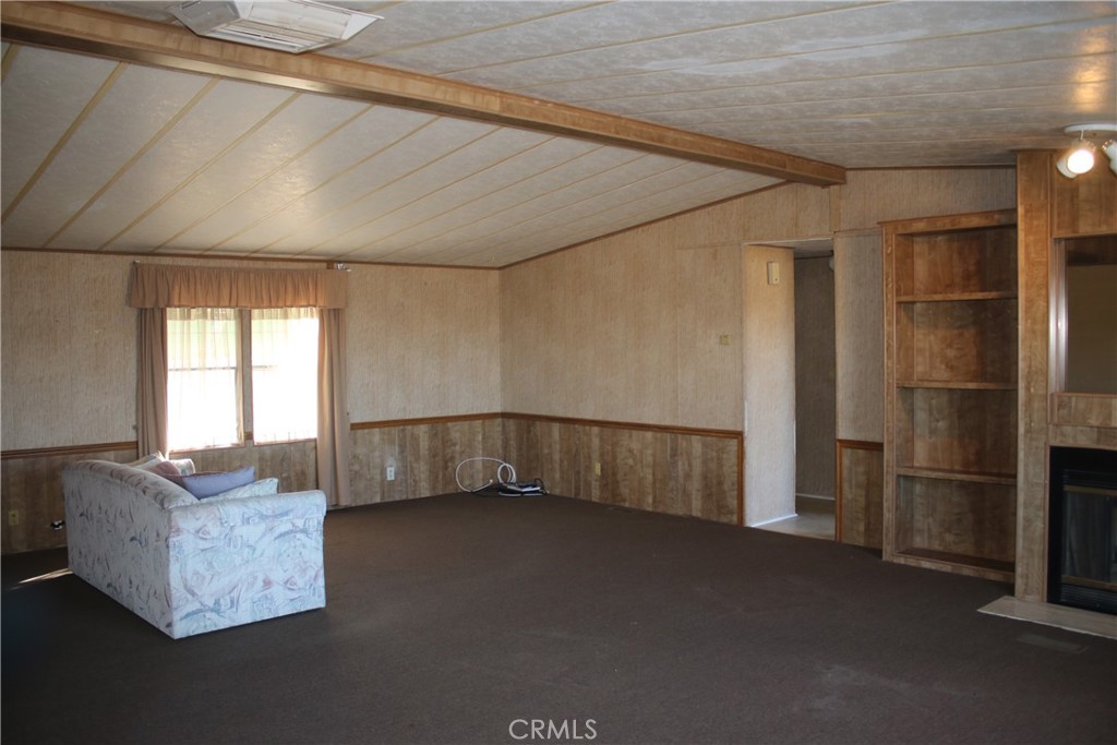 1147 Cherokee Trail Yucca Valley, CA 92284 - Photo 3 of 27 a view of an empty room with a window