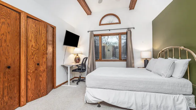 a bathroom with a sink vanity and a mirror