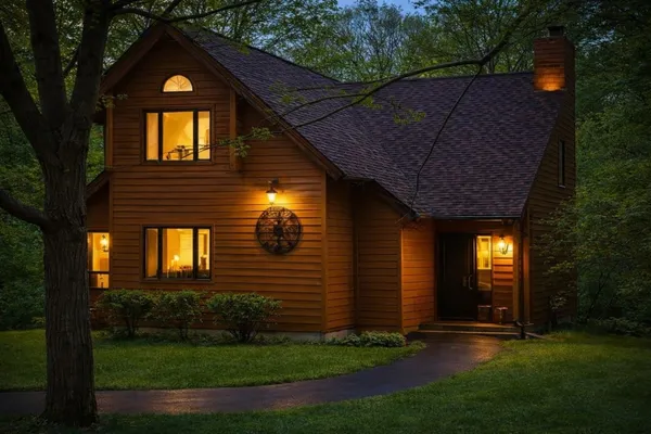 front view of a house with a yard