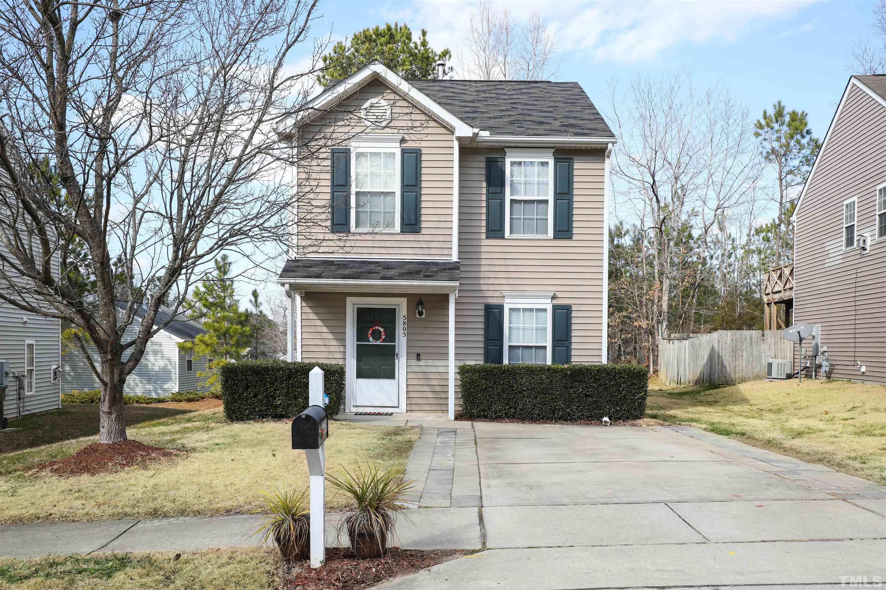 5805 Wynmore Road Raleigh, NC 27610 - Photo 1 of 20 a front view of a house with a yard