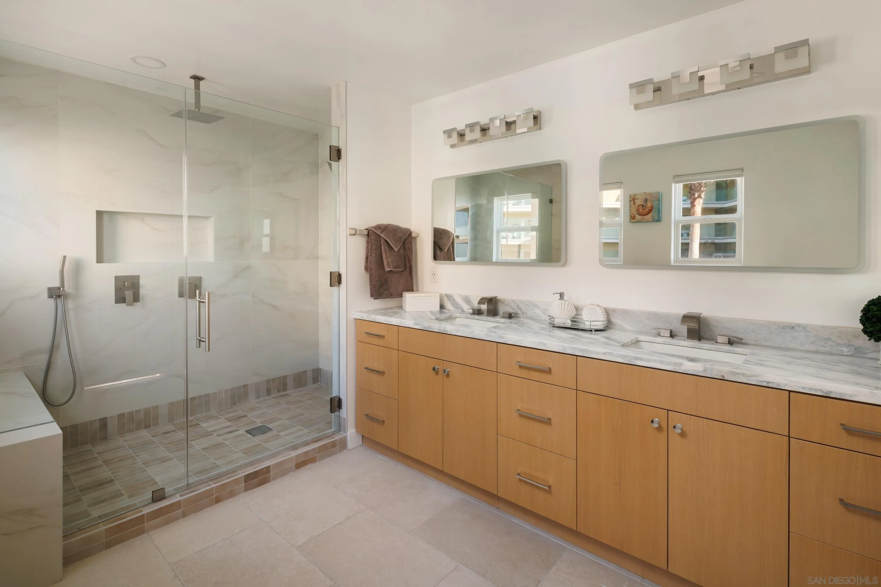 806 Ocean Lane Imperial Beach, CA 91932 - Photo 20 of 59 a bathroom with a granite countertop sink mirror and shower