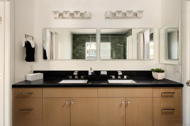 a view of a livingroom with furniture and a window