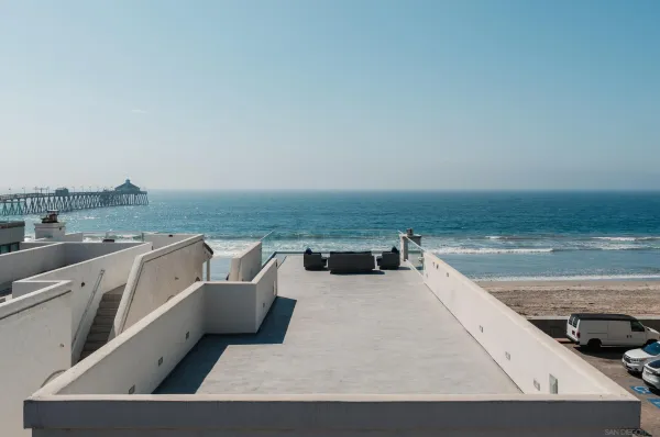 a view of a balcony with city view