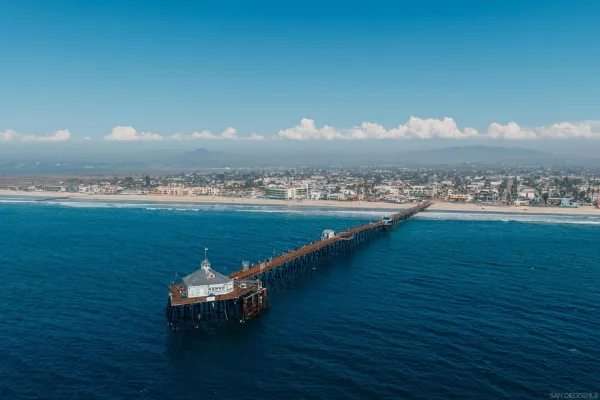 a view of a swimming pool with an outdoor seating
