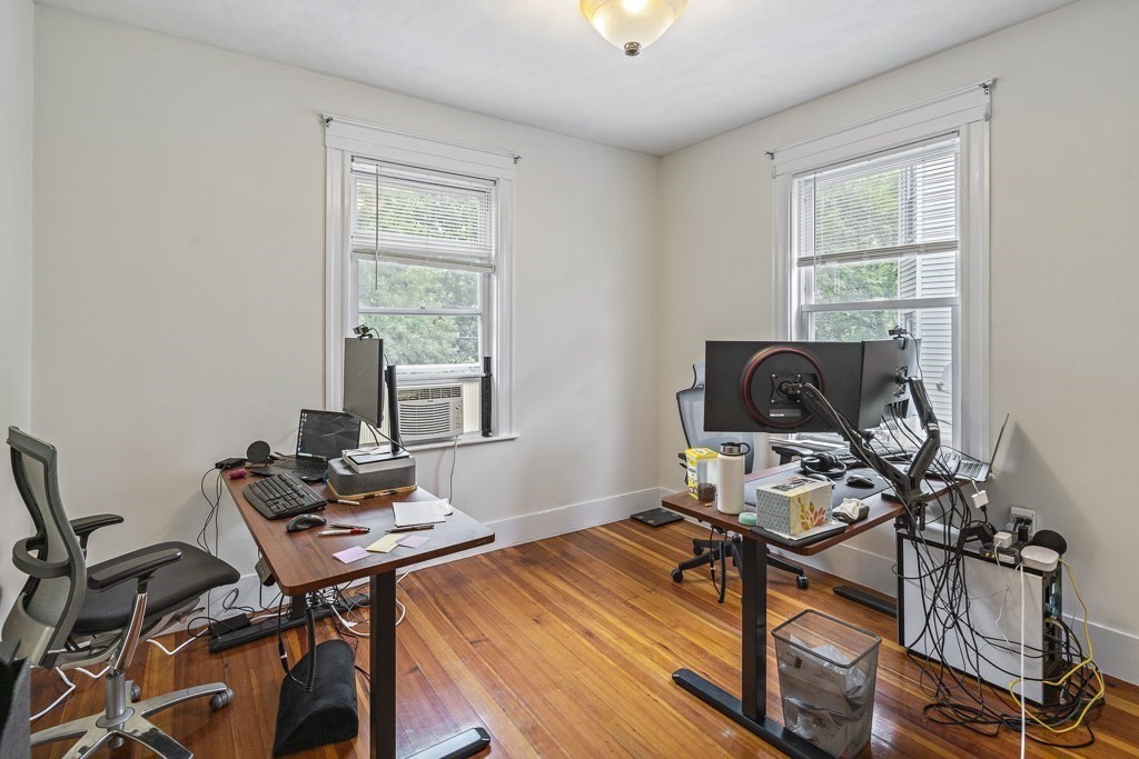 105 Walnut Street Somerville, MA 02145 - Photo 20 of 37 a workspace with furniture and a window