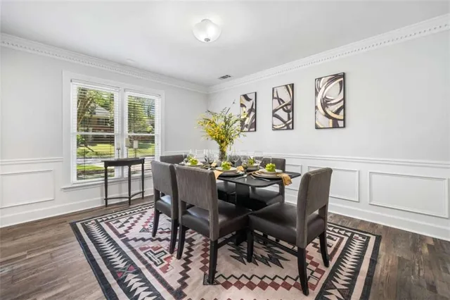 a view of a livingroom with furniture and windows