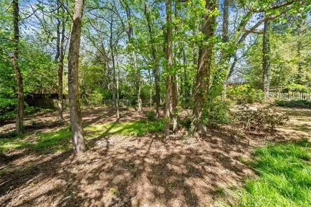 an aerial view of a house with a garden
