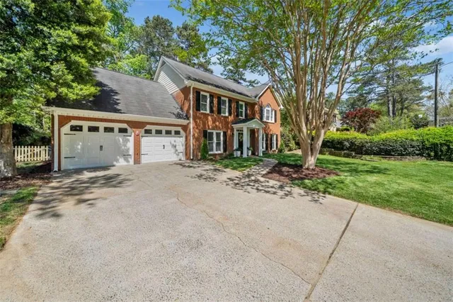 a view of a chairs and table in the balcony