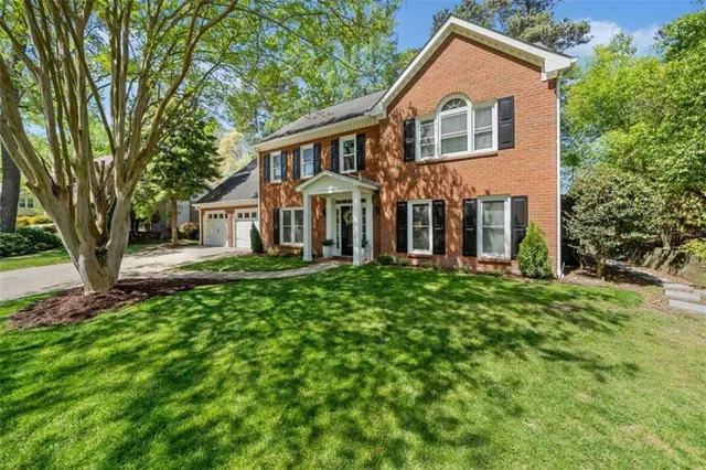 an aerial view of a pool patio kitchen yard and outdoor seating
