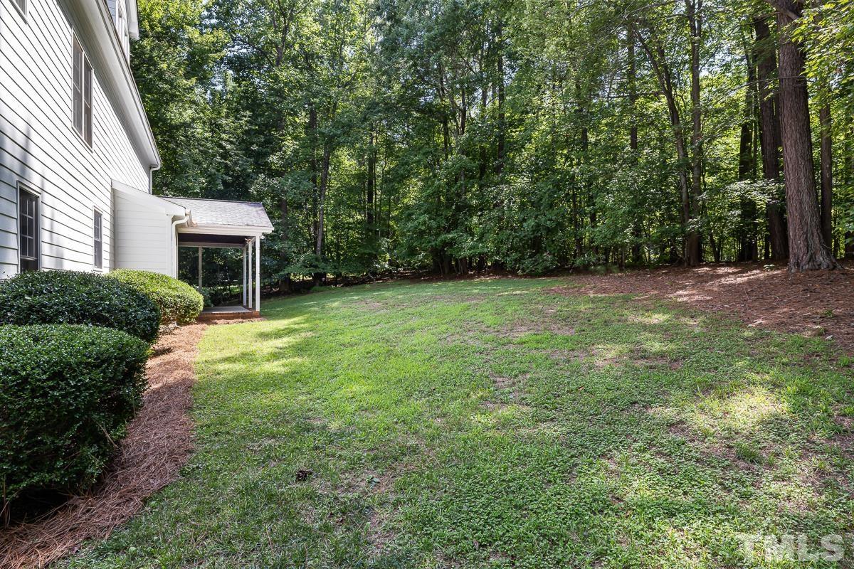 11615 John Allen Road Raleigh, NC 27614 - Photo 3 of 29 a view of a house with a backyard
