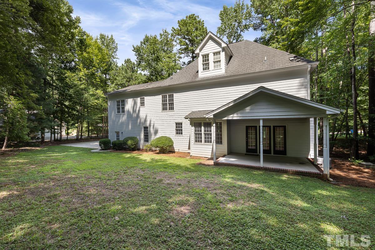 11615 John Allen Road Raleigh, NC 27614 - Photo 5 of 29 a front view of a house with a yard and trees