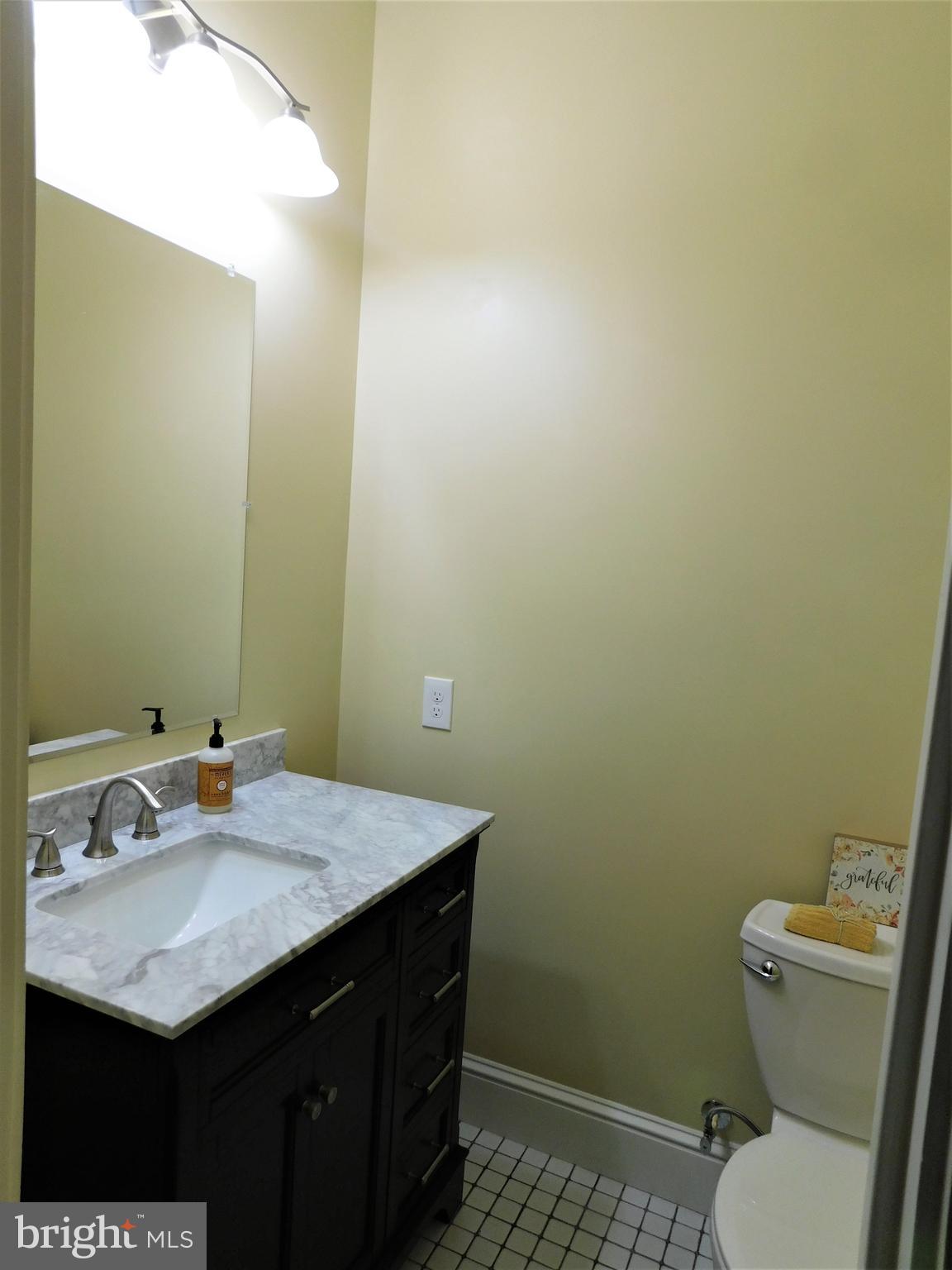 7710 Vermont Road Rhoadesville, VA 22542 - Photo 23 of 92 Powder room on main level new sink vanity & toilet