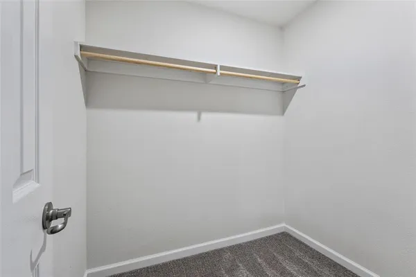 a view of small space with racks on the wall