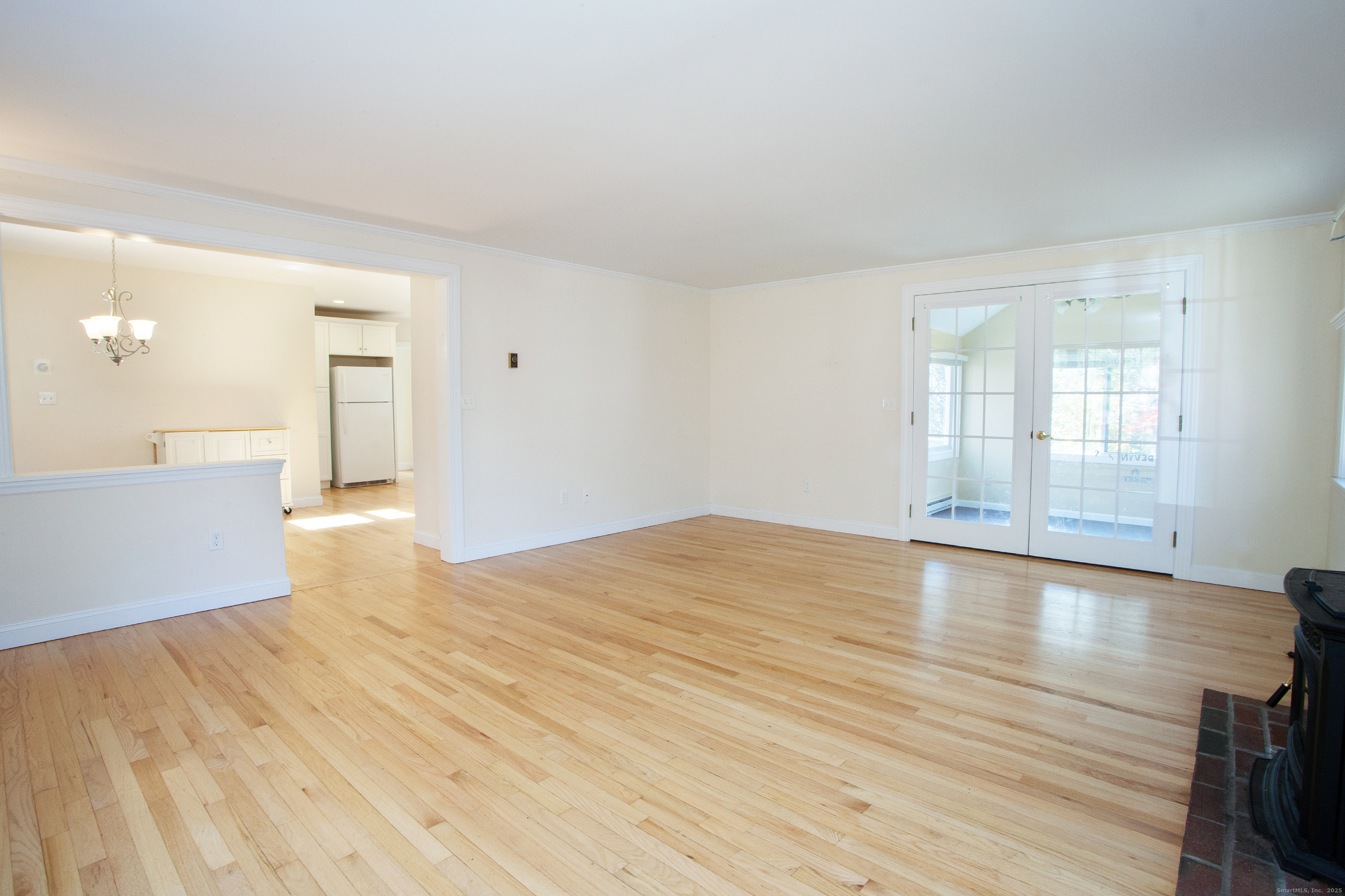 80 Walnut Hill Road East Hartland, CT 06027 - Photo 16 of 33 wooden floor in an empty room with a window