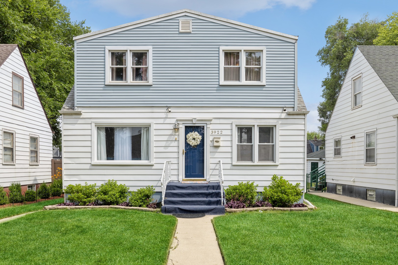 3922 West 85th Place Chicago, IL 60652 - Photo 1 of 17 a front view of a house with a yard