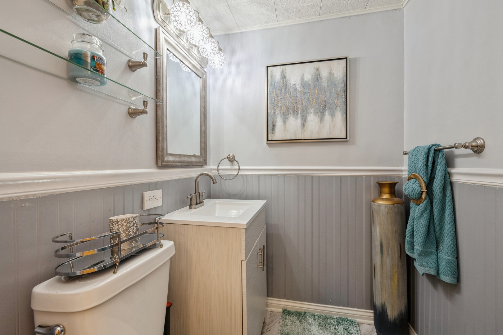 3922 West 85th Place Chicago, IL 60652 - Photo 12 of 17 a bathroom with a sink and a toilet