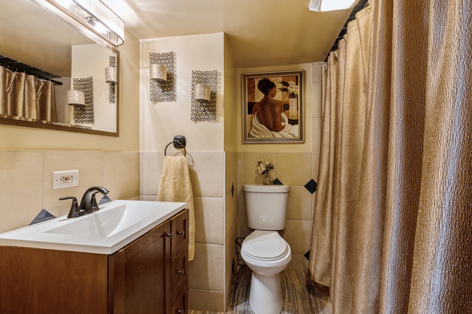3922 West 85th Place Chicago, IL 60652 - Photo 13 of 17 a bathroom with a toilet sink and mirror