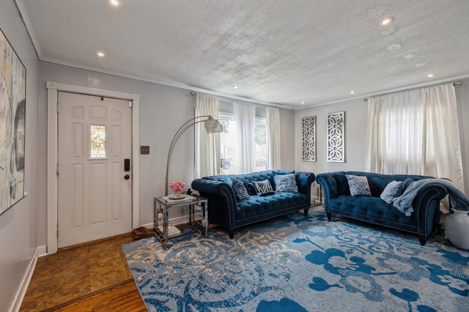 3922 West 85th Place Chicago, IL 60652 - Photo 3 of 17 a living room with furniture and a couch