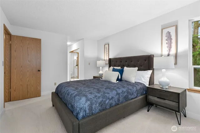 a living room with a couch and a window