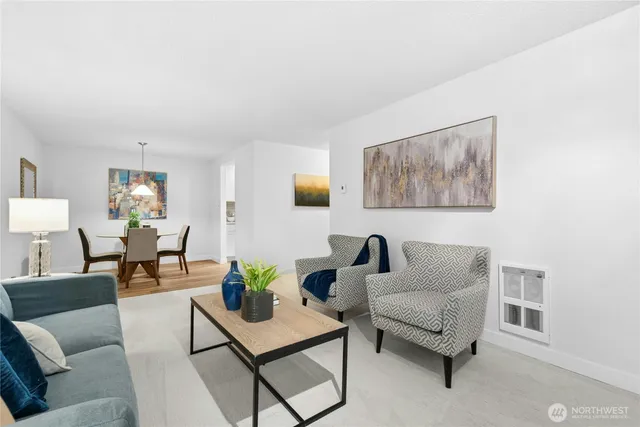 a bedroom with a bed and a lamp