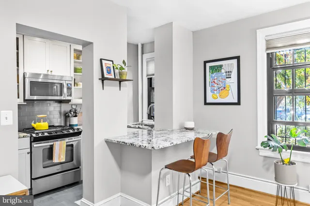 a view of a dining room with furniture